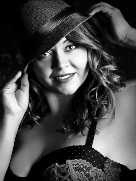 Glamour Shots Boudoir picture of woman wearing hat and lace