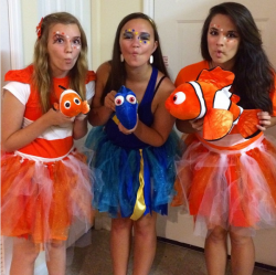 three girls dressed up as marlin, Dory and Nemo from Disney's Finding Dory